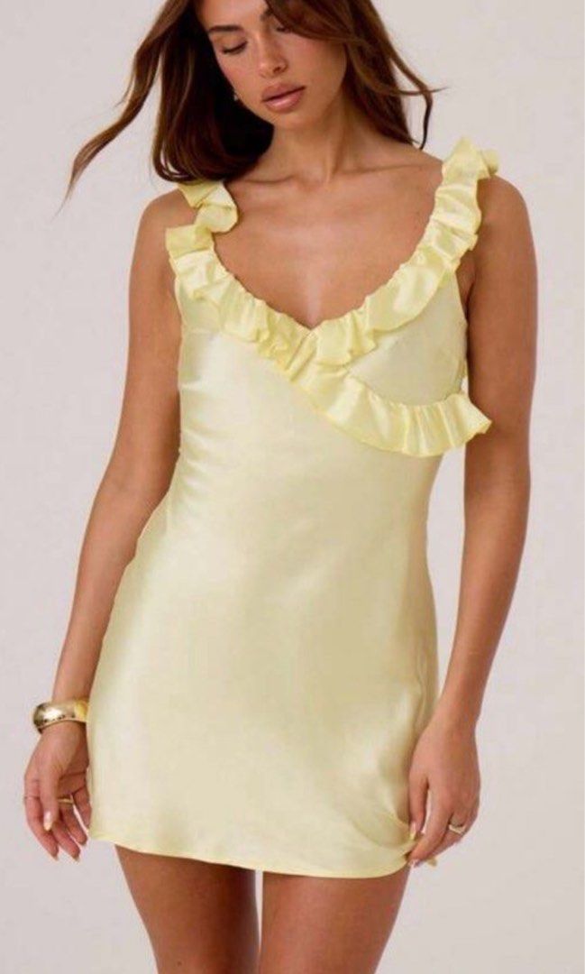 Shein yellow satin backless dress (Category: Dresses) located in Pasay City. Submitted by luvnixx (Listing ID 1464895864, Image 1). Description: Shein yellow backless dress Used once! Size small.
