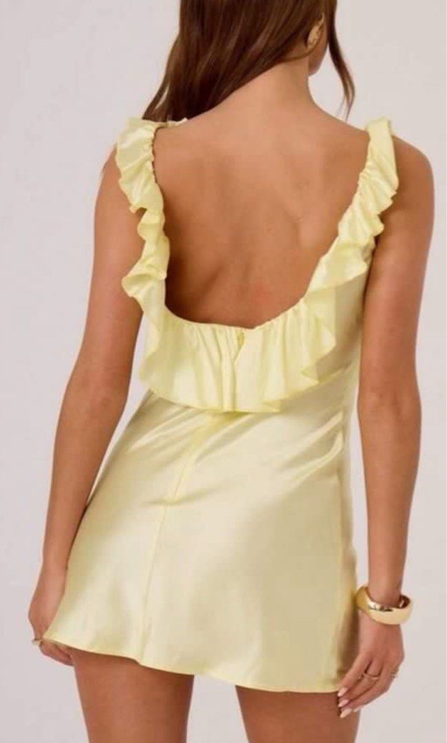 Shein yellow satin backless dress (Category: Dresses) located in Pasay City. Submitted by luvnixx (Listing ID 1464895864, Image 2). Description: Shein yellow backless dress Used once! Size small.