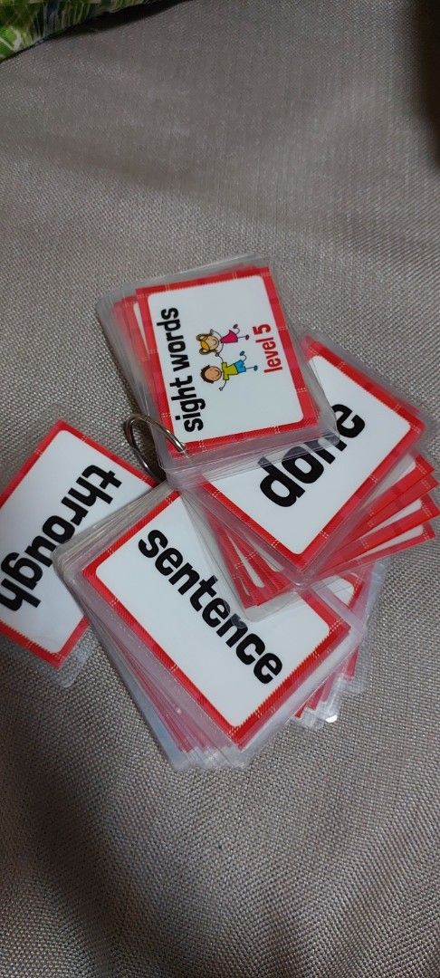 Sight Words Level 5 Flash Cards on Ring (Category: Educational & Learning Toys) located in Quezon City. Submitted by lisolette (Listing ID 1464790438, Image 2). Description: - Level 5 kids sight words flash cards (includes words like sentence, through, and done) - Durable clear plastic sleeves with cute red plaid borders - Convenient metal ring keeps cards secure and easy to flip - Portable and great for reading practice at home or on-the-go - Ex