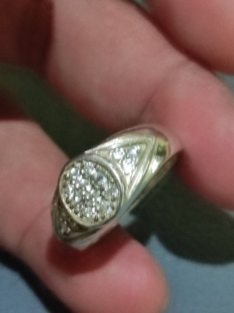 Silver 925 EStatement Ring with White Stones (Category: Rings) located in Cavite. Submitted by noblepenguin_6c8662 (Listing ID 1464859712, Image 2). Description: - Material/Finish: Heavy silver band with a clean, polished finish - Design: Evil-Eye design Round center pave cluster with sparkling side cryst - Style: Bold statement piece, versatile for daily wear or special occasions - Condition: Excellent, shiny, and well-maintained - Shipping: Fas