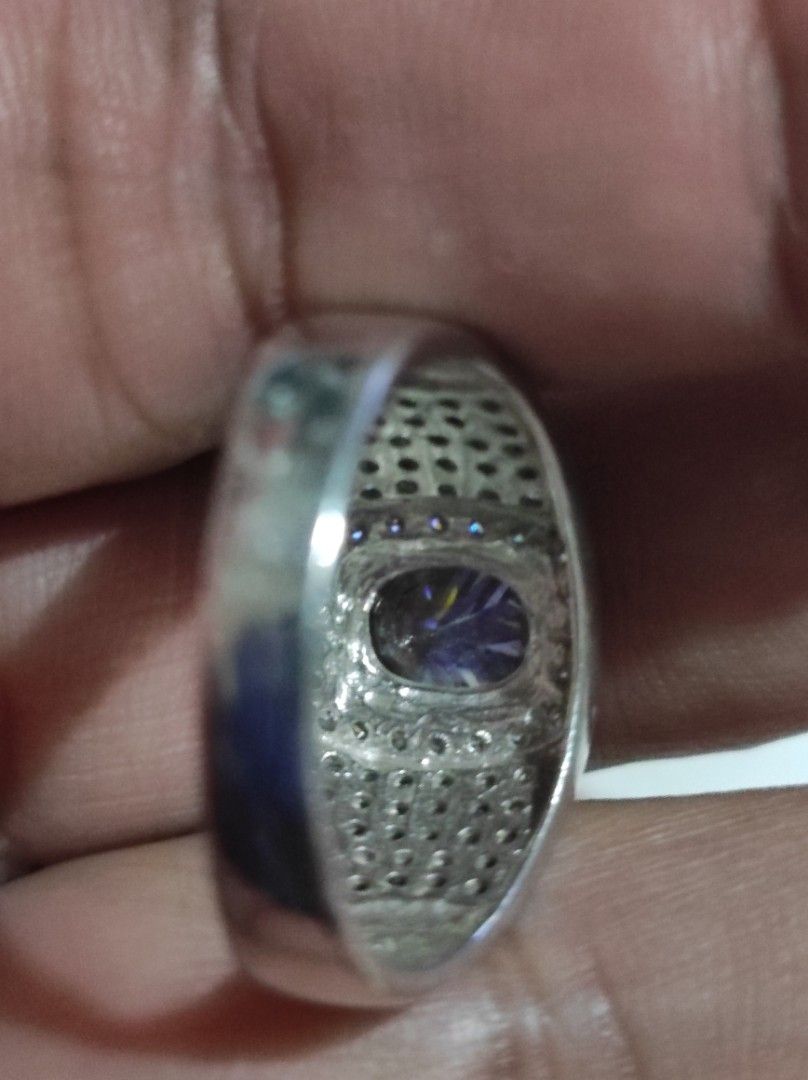 Silver Oval Tourmaline Ring with Pave Band (Category: Rings) located in Cavite. Submitted by noblepenguin_6c8662 (Listing ID 1464896593, Image 3). Description: - Bold Silver cocktail ring with a large oval Tourmaline center stone - Surrounded by smaller clear possibly zirconia stones and heavily encrusted pave crystals - Features an intricate cutout backing behind the main setting - Substantial, high-quality weight for a luxurious feel.