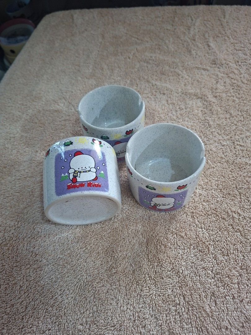 Snow Kids Medium Ash Tray (Category: Other Stationery & Craft) located in Consolacion. Submitted by luxekerei (Listing ID 1464773791, Image 1). Description: - vintage ceramic ashtrays featuring a "Snow Kids" snowman illustration on a speckled stone-textured base..