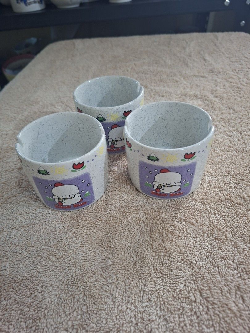 Snow Kids Medium Ash Tray (Category: Other Stationery & Craft) located in Consolacion. Submitted by luxekerei (Listing ID 1464773791, Image 2). Description: - vintage ceramic ashtrays featuring a "Snow Kids" snowman illustration on a speckled stone-textured base..
