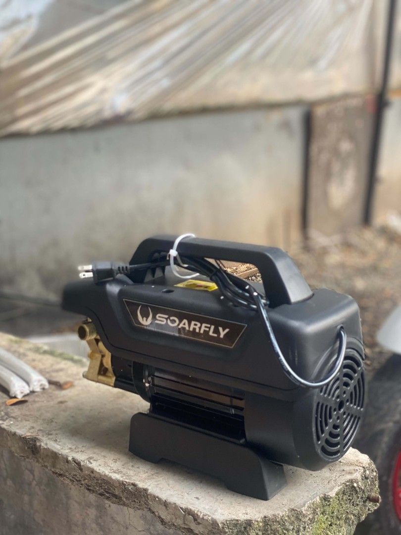 Soarfly High Pressure Washer Electric Water Pump (Category: Cleaning Tools & Supplies) located in Malolos. Submitted by merika06 (Listing ID 1464804352, Image 1). Description: 1999 only !! brandnew 4800 watts 09058634365 text lang po - Brand: Soarfly High Pressure Washer - Color: Compact black unit with integrated handle - Features: Built-in pressure gauge and easy-reach side on/off switch - Durability: Premium brass fittings for secure hose atta