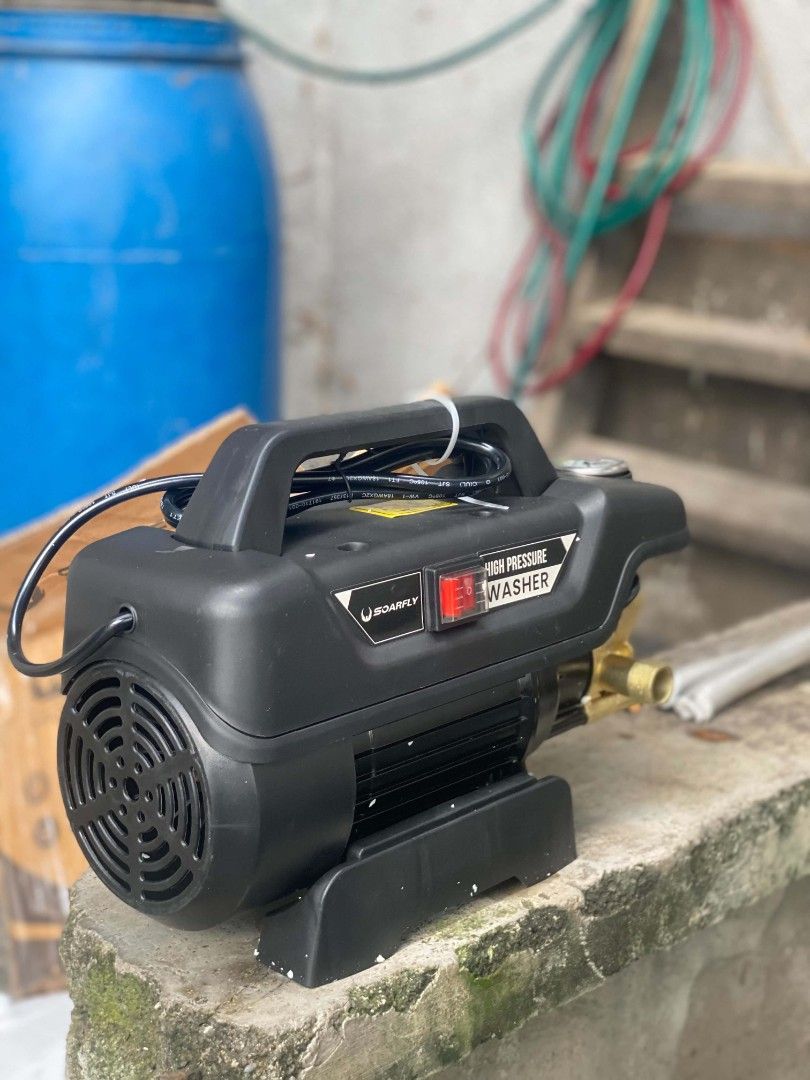 Soarfly High Pressure Washer Electric Water Pump (Category: Cleaning Tools & Supplies) located in Malolos. Submitted by merika06 (Listing ID 1464804352, Image 3). Description: 1999 only !! brandnew 4800 watts 09058634365 text lang po - Brand: Soarfly High Pressure Washer - Color: Compact black unit with integrated handle - Features: Built-in pressure gauge and easy-reach side on/off switch - Durability: Premium brass fittings for secure hose atta