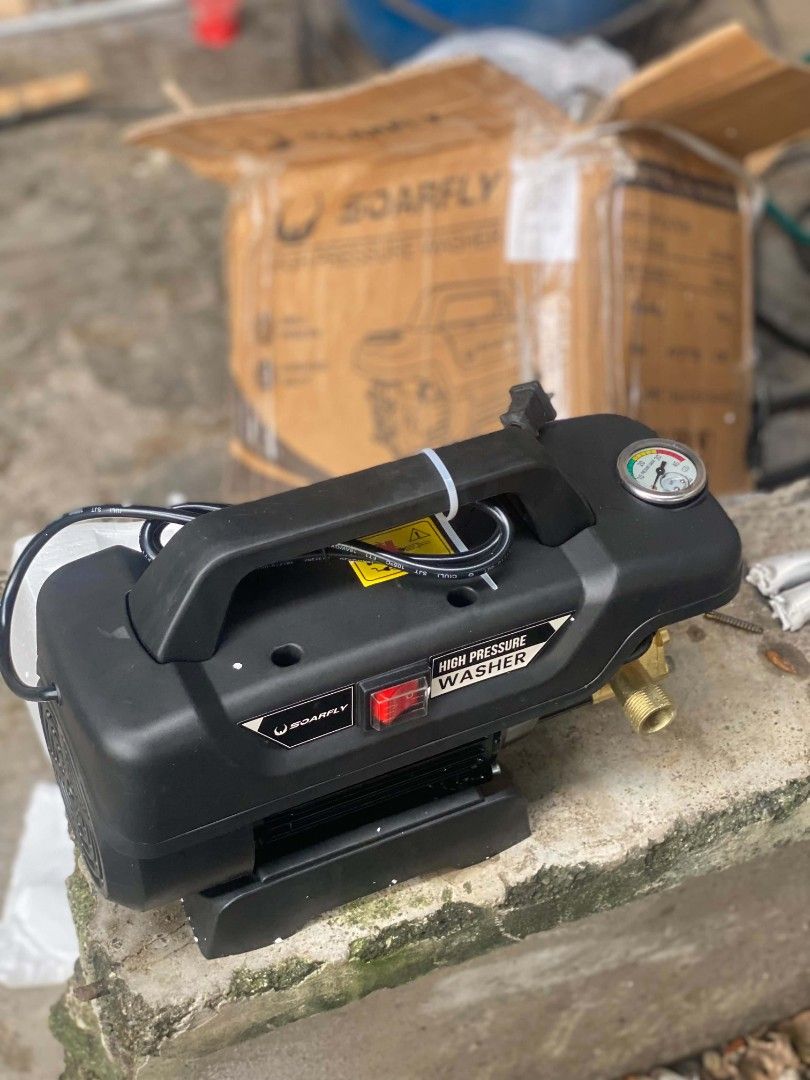 Soarfly High Pressure Washer Electric Water Pump (Category: Cleaning Tools & Supplies) located in Malolos. Submitted by merika06 (Listing ID 1464804352, Image 2). Description: 1999 only !! brandnew 4800 watts 09058634365 text lang po - Brand: Soarfly High Pressure Washer - Color: Compact black unit with integrated handle - Features: Built-in pressure gauge and easy-reach side on/off switch - Durability: Premium brass fittings for secure hose atta
