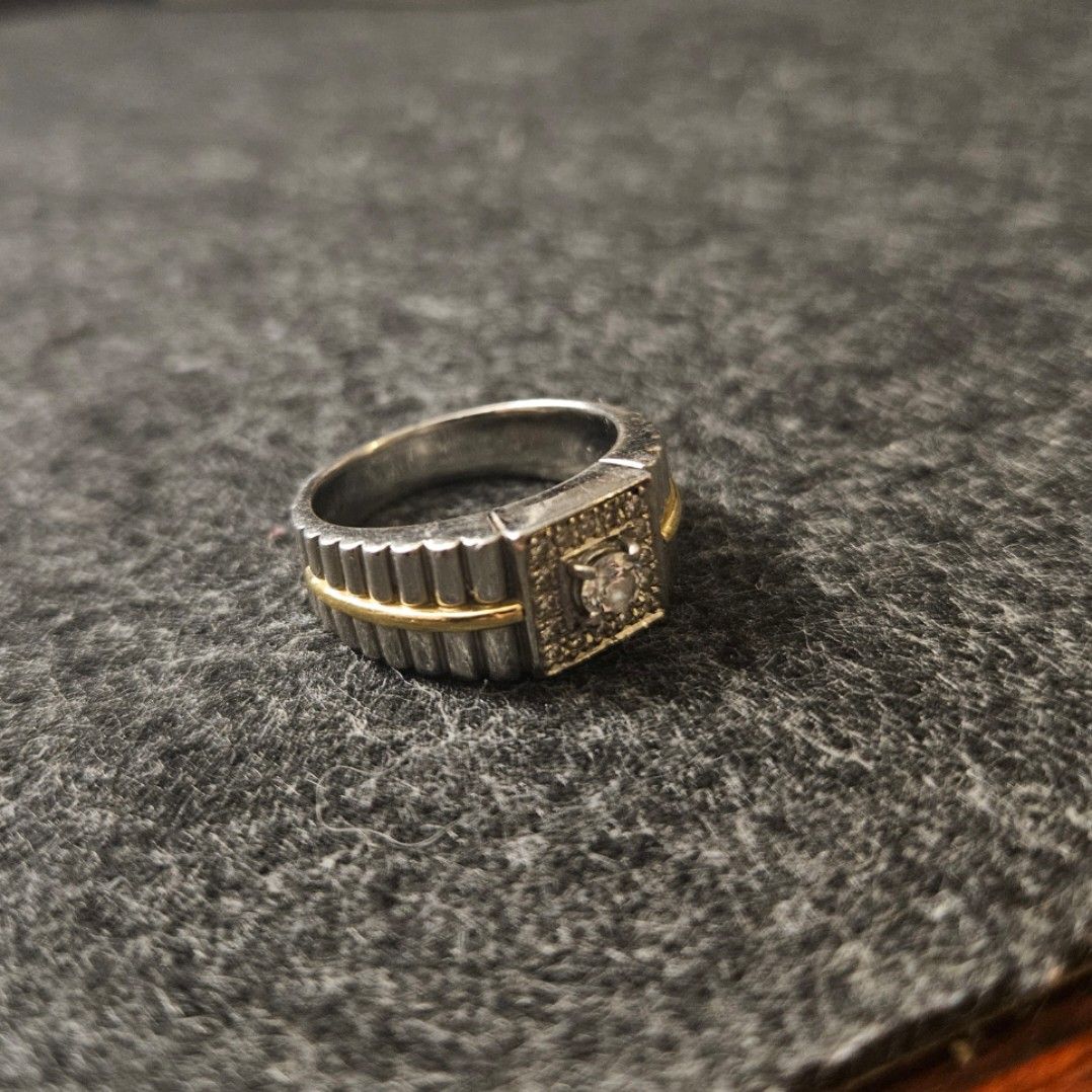 Solid Pt900/k18 Yellow Gold Rolex style Japan ring (Category: Jewelry) located in Manila. Submitted by j1onee (Listing ID 1464888377, Image 2). Description: This is an incredible asset to hold as precious metal prices continue to reach all-time highs. Very solid, heavy, and striking on the hand. SPECIFICATIONS: • Material: Solid Pt900 Platinum & k18 Yellow Gold • Weight: Heavy 18.0 Grams (Very substantial weight for a ring) • Size: #18.5 Japan (a