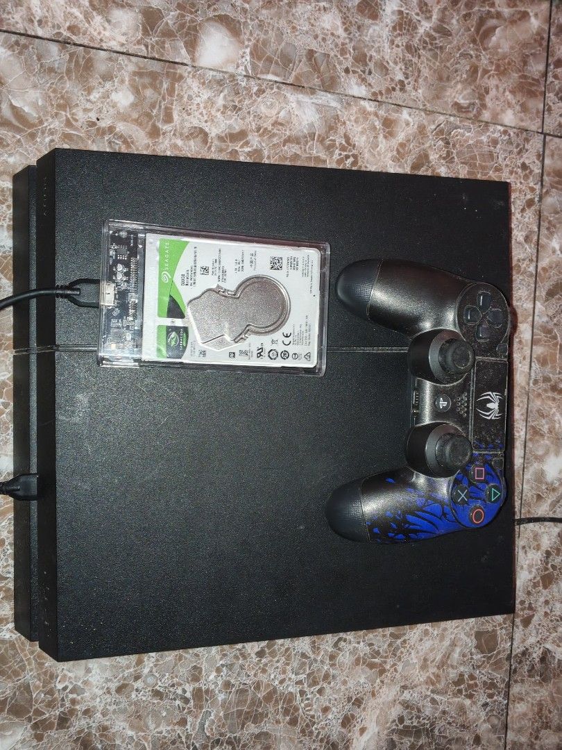 Sony PlayStation 4 PS4 Console with Controller and Games (Category: PlayStation) located in San Pedro. Submitted by kenken1678 (Listing ID 1464968662, Image 1). Description: PS4 JB 500GB With Original DS4 GoldHEN Games Included: God of War RDR2 GTA V Ghost of Tsushima Sekiro Elden Ring Shadow of the Colossus Horizo Uncharted Collection Bomb Rush Cyberfunk NBA 2K25 Wala nang gagawin lalaruin na lang No issues 7,300 kung kasama yung 500GB HDD Meetu