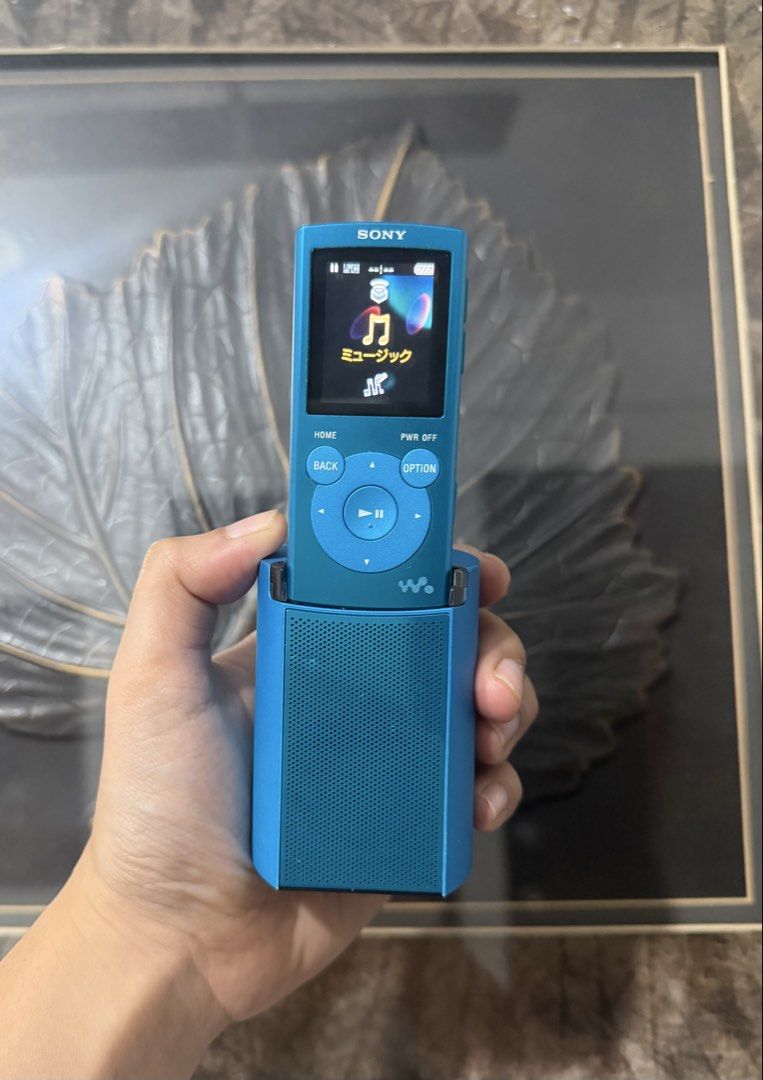 Sony Walkman NW-E062 with Active Speaker System RDP-NWT6M (Category: Portable Music Players) located in Marikina City. Submitted by s.cyrelle2202 (Listing ID 1464905488, Image 1). Description: Blue Sony Walkman digital music player model NW-E062 with matching RDP-NWT6M active speaker dock in blue. Device powers on, but screen displays menu in Japanese. I tried but I can’t change the language to english. Battery charges through the dock. Compact s