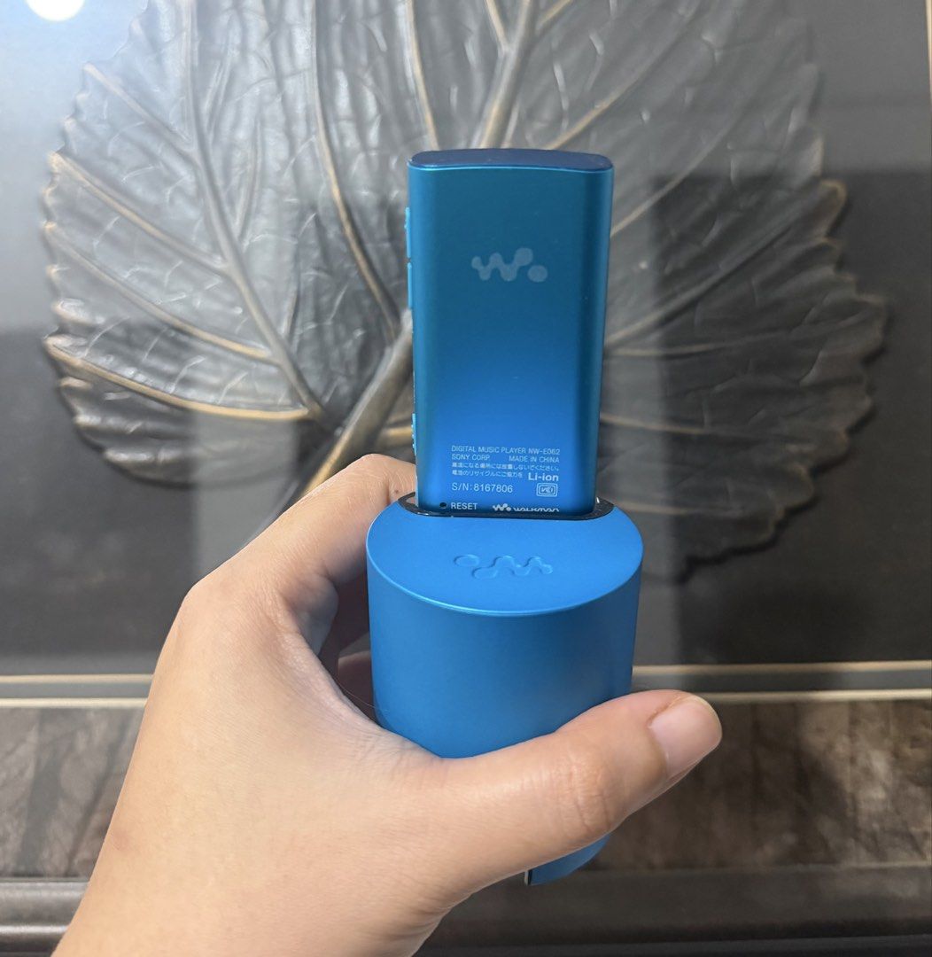 Sony Walkman NW-E062 with Active Speaker System RDP-NWT6M (Category: Portable Music Players) located in Marikina City. Submitted by s.cyrelle2202 (Listing ID 1464905488, Image 2). Description: Blue Sony Walkman digital music player model NW-E062 with matching RDP-NWT6M active speaker dock in blue. Device powers on, but screen displays menu in Japanese. I tried but I can’t change the language to english. Battery charges through the dock. Compact s