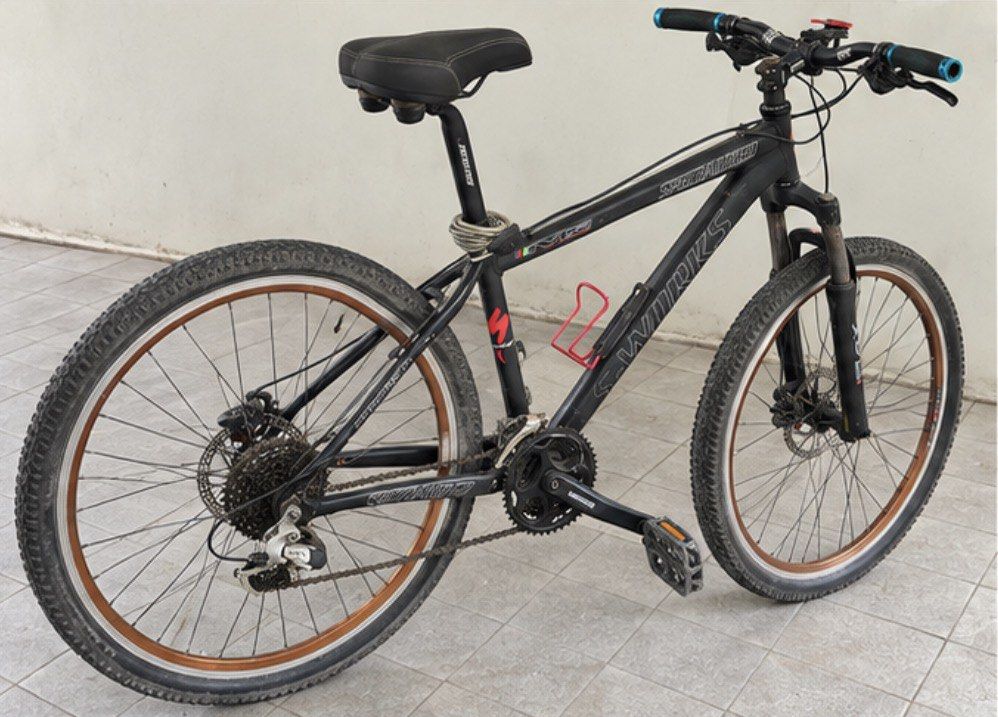 Specialized S-Works M5 Mountain Bike (Category: Bicycles) located in Muntinlupa City. Submitted by shopnb (Listing ID 1464779449, Image 2). Description: Selling a Specialized S-Works M5 mountain bike. Classic lightweight MTB with a solid frame and good components Features: * Specialized S-Works M5 frame * Shimano drivetrain/components * Shimano disc brakes * Front suspension fork * Knobby MTB tires * Alloy wheels with tan/brown rims * Bottle cage