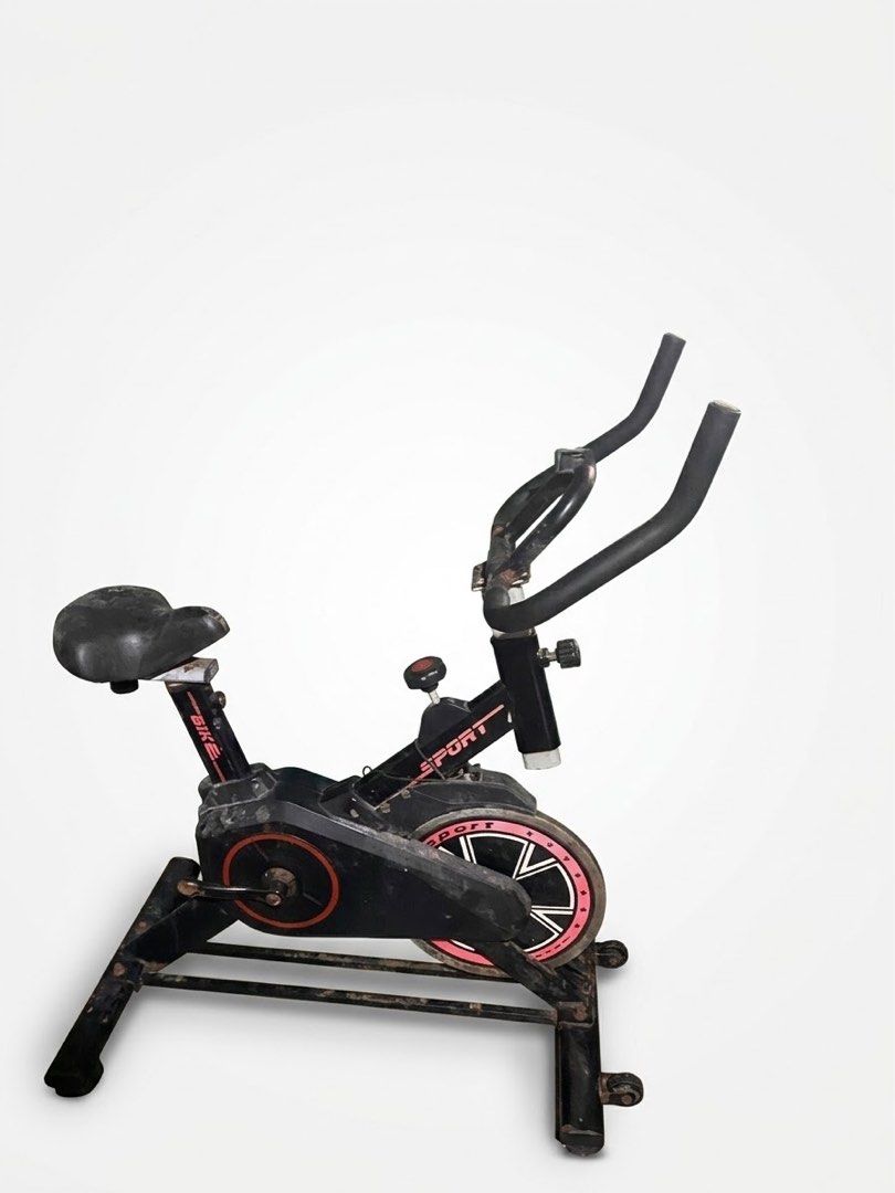 Stationary Exercise Bike (Category: Cardio & Fitness Machines) located in Cavite. Submitted by jamstore89 (Listing ID 1464809229, Image 1). Description: Fs Stationary exercise bike Issue : some rust, need cleaning and the pedal need to fix it (welding spot) P1,000 Paranaque - Color: Black with stylish pink accents - Sturdy heavy-duty metal frame with front transport wheels - Fully adjustable handlebars and comfortable padded seat - Easy-to-use re
