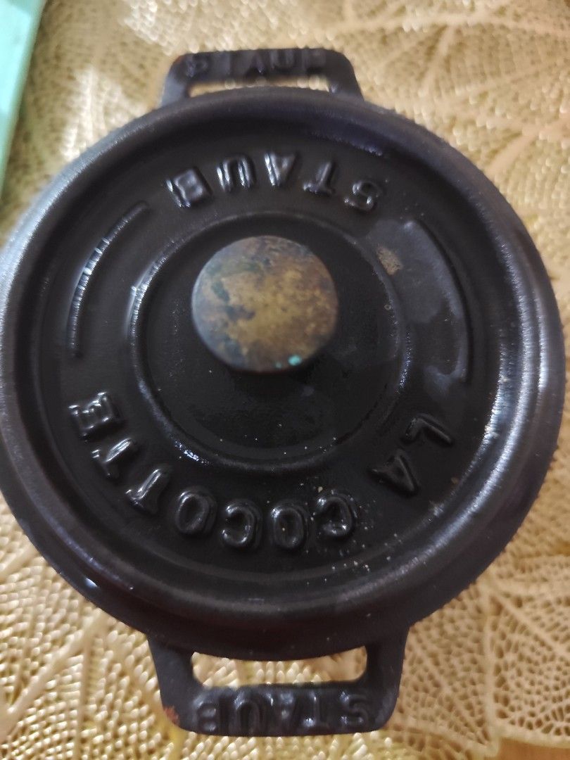 Staub Cast Iron Mini Cocotte (Category: Cookware & Accessories) located in Manila. Submitted by marriage031073advocate (Listing ID 1464421364, Image 2). Description: - Mini Staub cast iron cocotte - Black enamel finish - Embossed Staub logo on lid - Ideal for individual servings or small dishes - Perfect for baking and serving *""REPRICE.