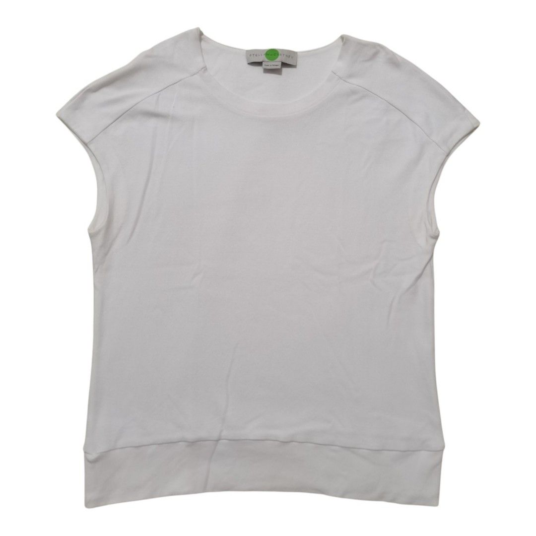 Stella McCartney Luxury Cap-Sleeve White Tee (Category: Sleeveless) located in Santa Cruz. Submitted by oddpenguin-4575 (Listing ID 1464936760, Image 1). Description: 📌.....P L E A S E R E A D..... 📌measurement:Laid flat Sh-21.5"/Sleeve-10"/Chest-18"/Lenght-23.5"/armhole-6"/armpit-__ 📌size:Filipino Women's Size Small to Medium (S/M) for a standard fitted look, or a Size Small (S) if you prefer a slightly relaxed, draped fit. 📌color-9/10 📌 Br