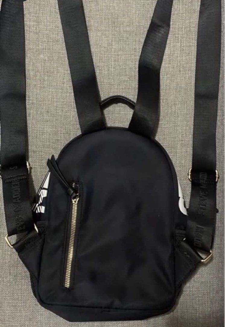 Steve Madden backpack (Category: Backpacks) located in Manila. Submitted by bwshoppe (Listing ID 1464915237, Image 2). Description: STEVE MADDEN black backpack (small size) with 1 zip pocket infront, 1 zip pocket back, 1 inner zip pocket & 2 inner slip on pockets Made of Nylon similar to longchamp fabric texture (water repellant)& light to carry. Purchased in US Outlet Mall . .