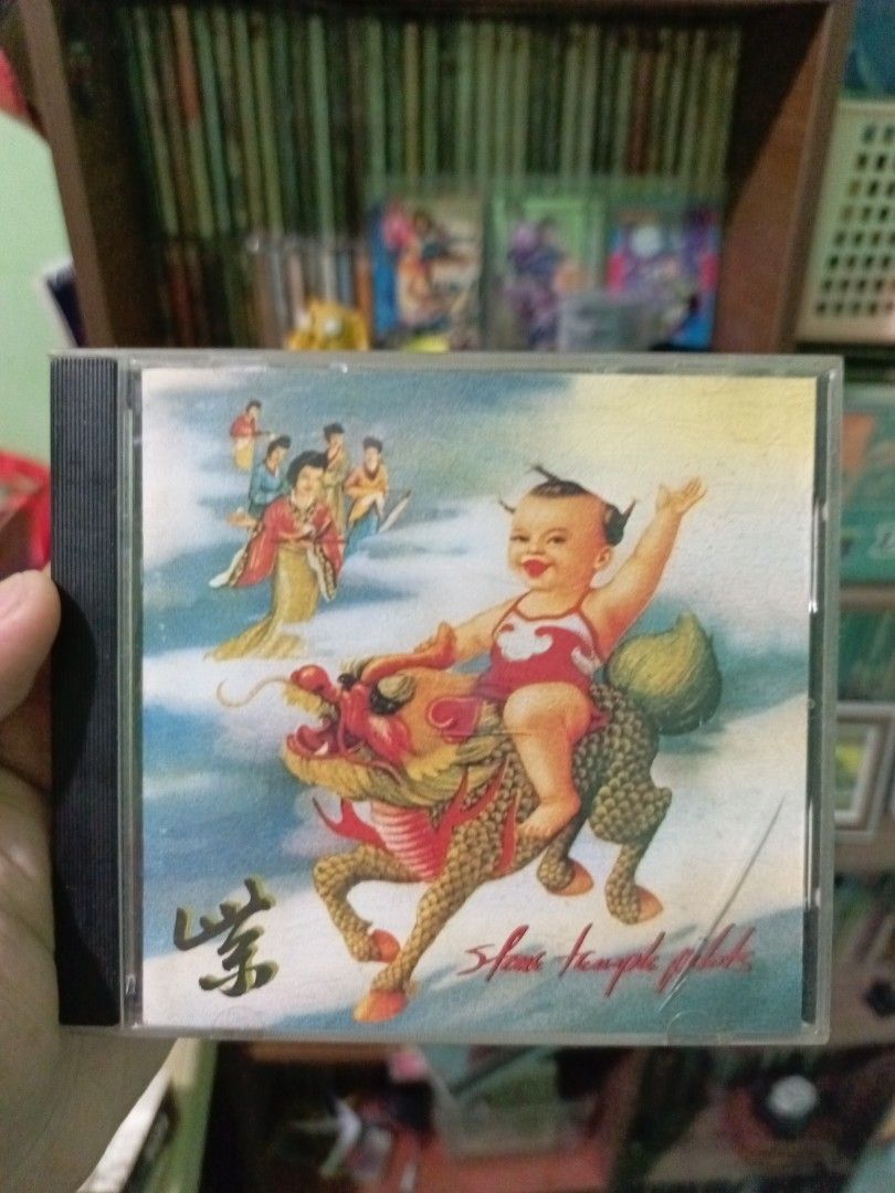 Stone Temple Pilots Purple CD Album (Category: CDs & DVDs) located in Manila. Submitted by crashandburn101 (Listing ID 1464946840, Image 1). Description: - Artist & Album: Stone Temple Pilots - Purple - Format: Audio CD in standard jewel case - Genre: Classic 90s Alternative Rock - Artwork: Iconic cover featuring a baby on a mythical creature - Condition: Includes disc, ready to play - Note: A must-have addition to any rock music collection.