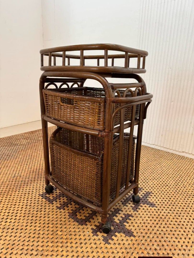 Storage Cart Rattan (Category: Shelves, Cabinets & Racks) located in Meycauayan. Submitted by marygracecasimiro (Listing ID 1464770959, Image 3). Description: Vintage Rattan Rolling Storage Cart with 2 Removable Wicker Baskets Price: 5,200 L22 x W14 x H34 In good condition🩷🧡 It can also be used as a kitchen cart, bathroom organizer, laundry trolley, or bedside storage cart..