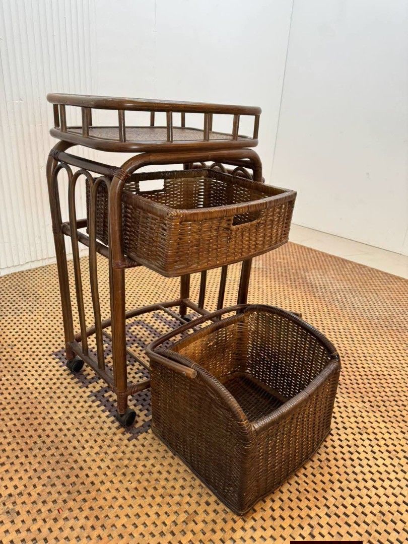 Storage Cart Rattan (Category: Shelves, Cabinets & Racks) located in Meycauayan. Submitted by marygracecasimiro (Listing ID 1464770959, Image 2). Description: Vintage Rattan Rolling Storage Cart with 2 Removable Wicker Baskets Price: 5,200 L22 x W14 x H34 In good condition🩷🧡 It can also be used as a kitchen cart, bathroom organizer, laundry trolley, or bedside storage cart..