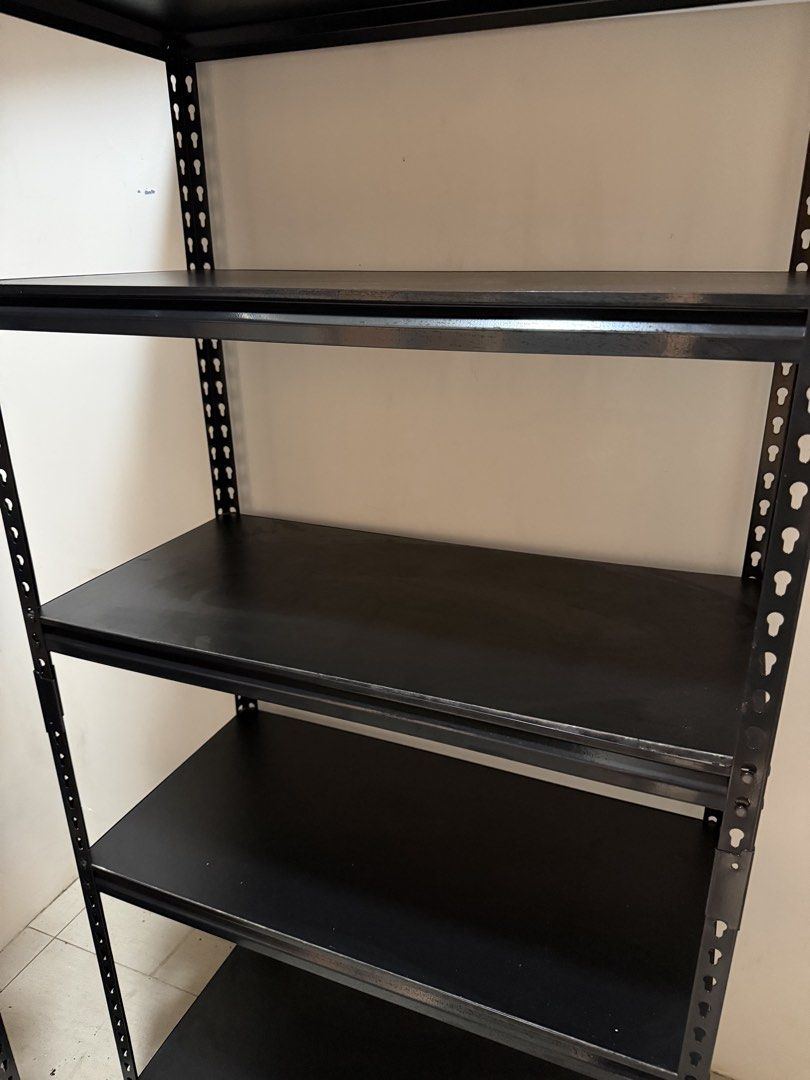 Storage Rack Heavy Duty (Category: Storage Boxes & Baskets) located in Marikina City. Submitted by cluttermatters (Listing ID 1464950053, Image 3). Description: - 1,800 per pc - Sturdy black metal shelving unit - 5 tiers for ample storage - Ideal for home, garage, or workshop organization - Boltless, easy assembly and adjustable shelf heights .