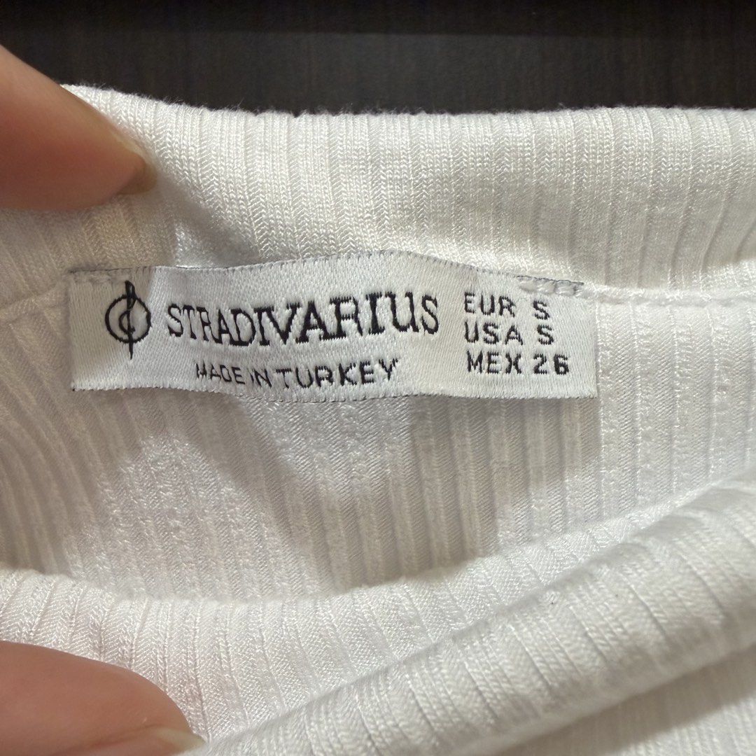 Stradivarius White Ribbed Off-Shoulder Top Size S (Category: Sleeveless) located in Marikina City. Submitted by lou.and.trio (Listing ID 1464891643, Image 3). Description: LAST PRICE AS POSTED - Color: Clean white - Size: S (fits true to size) - Material: Ribbed stretchy fabric - Condition: Washed but never worn.