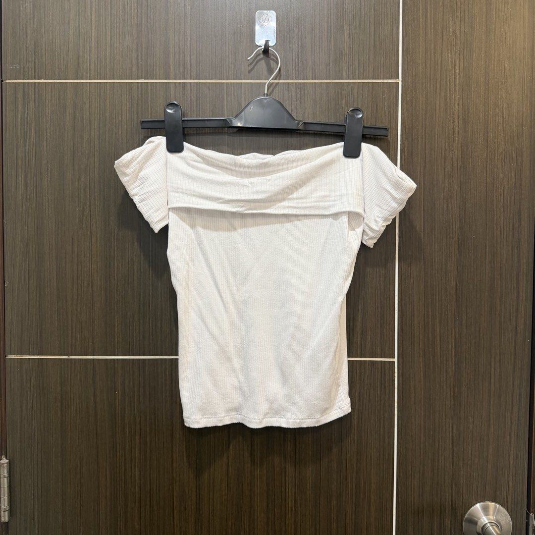 Stradivarius White Ribbed Off-Shoulder Top Size S (Category: Sleeveless) located in Marikina City. Submitted by lou.and.trio (Listing ID 1464891643, Image 2). Description: LAST PRICE AS POSTED - Color: Clean white - Size: S (fits true to size) - Material: Ribbed stretchy fabric - Condition: Washed but never worn.