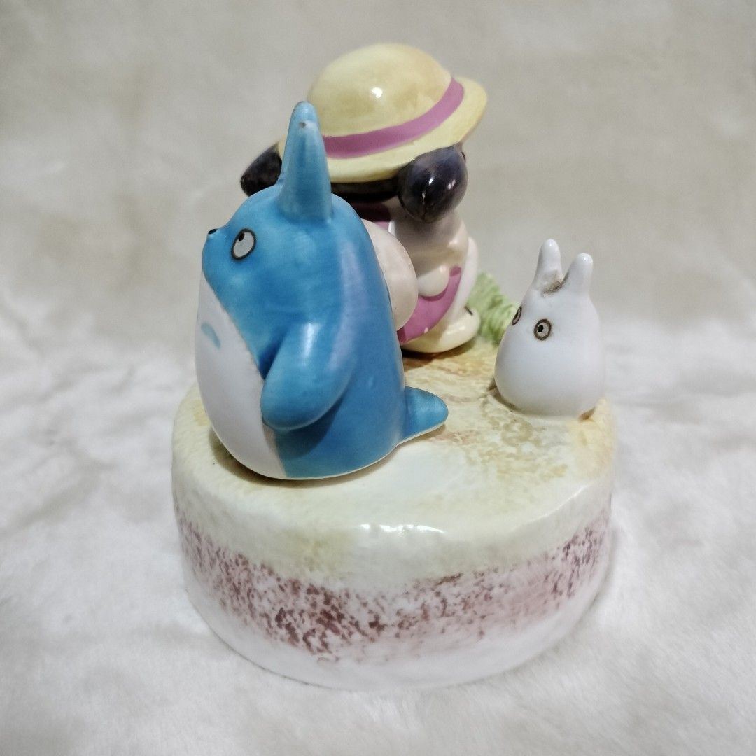 Studio Ghibli Totoro and Mei Ceramic Figurine (Category: Figurines & Statues) located in Imus. Submitted by viaysthriftshop (Listing ID 1464831721, Image 2). Description: - Authentic Studio Ghibli collectible featuring Mei, Chibi Totoro, and Chu Totoro ▪️height: 4 inches ▪️No cracks, no chips on characters and on top part ▪️minimal chips underneath on base part (please see last photo) -Originally a music box but this one missong musical mechanism