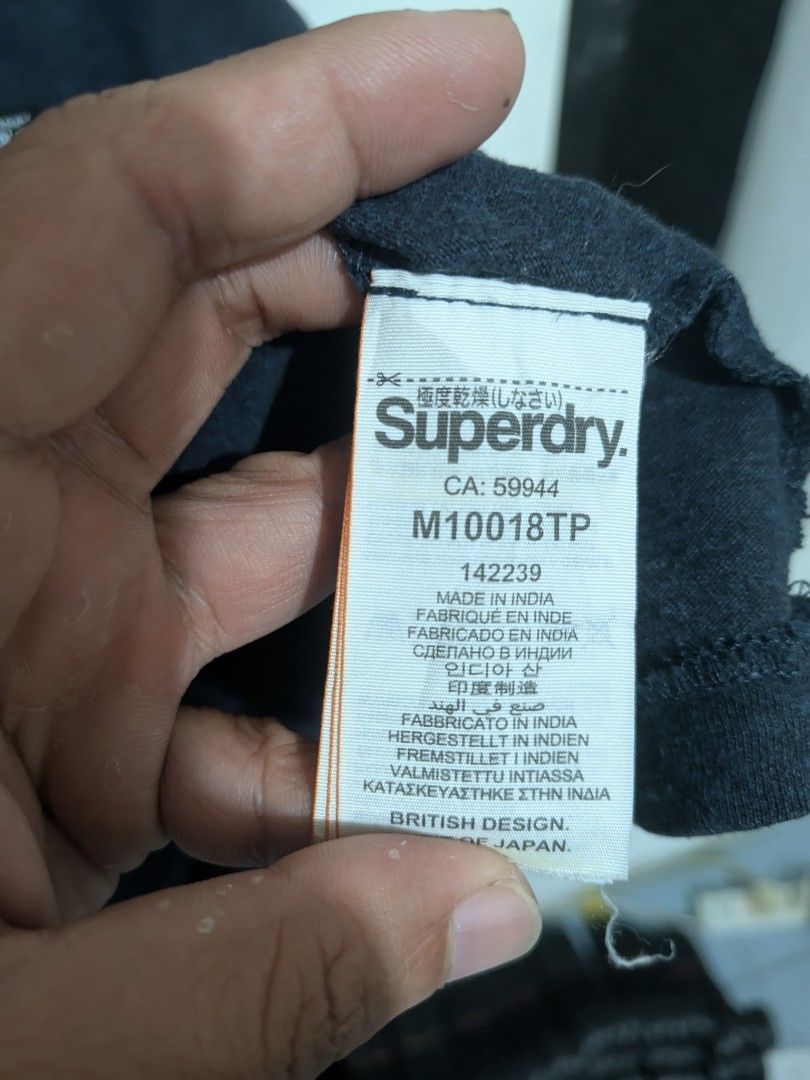Super dry pocket tee (Category: Activewear) located in Labo. Submitted by ronelryan (Listing ID 1464883897, Image 3). Description: Xl on tag 21 x 28.
