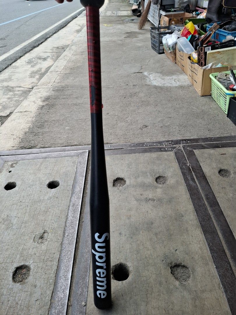 Supreme Black Baseball Bat (Category: Racket and Ball Sports) located in Manila. Submitted by rocksolid227 (Listing ID 1464789685, Image 3). Description: - Color/Design: Black bat with iconic white Supreme logo near the end - Handle: Red grip tape with minor wear, secured with electrical tape - Material/Size: Solid build, standard size - Condition: Pre-loved, great for collection or casual practice - Meetups and shipping options available within 