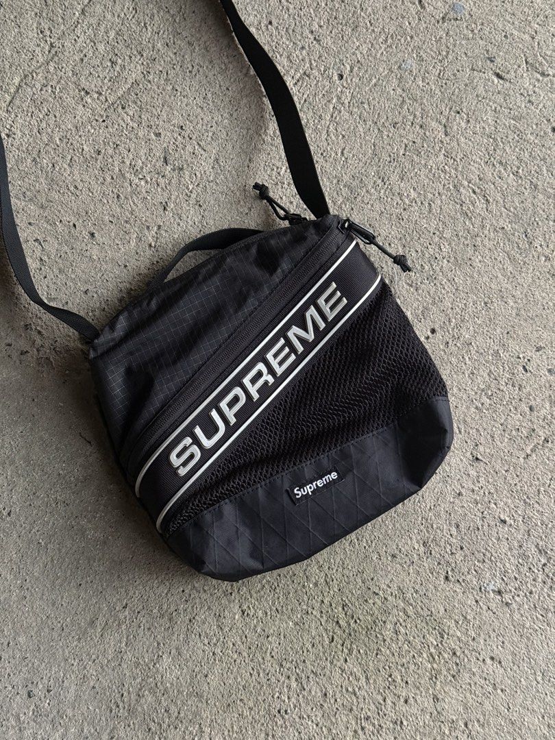 Supreme FW23 Black Shoulder Bag (Category: Sling Bags) located in Manila. Submitted by yamborghini22 (Listing ID 1464774334, Image 2). Description: Supreme FW23 Black Shoulder Bag Water resistant nylon ripstop with X-Pac® laminated base and 3M® Reflective molded logo webbing. 4L. Pristine condition ₱4500✨ .