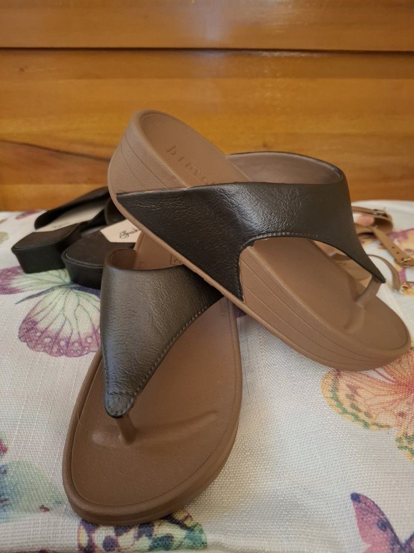 Take All 3 pairs Brand New (Category: Flats & Sandals) located in Muntinlupa City. Submitted by googoosh_collection (Listing ID 1464770250, Image 2). Description: -TAKE ALL - Bundle of 3 stylish women's shoes for daily wear - Pair 1: Black low block heels (Fashion brand) SIZE: 37 - Pair 2: Brown thong platform sandals with 'I LOVE' branding (SIZE: 38) - Pair 3: Tan ankle strap sandals (Gimii brand) SIZE:38 - Perfect variety for different outfits 
