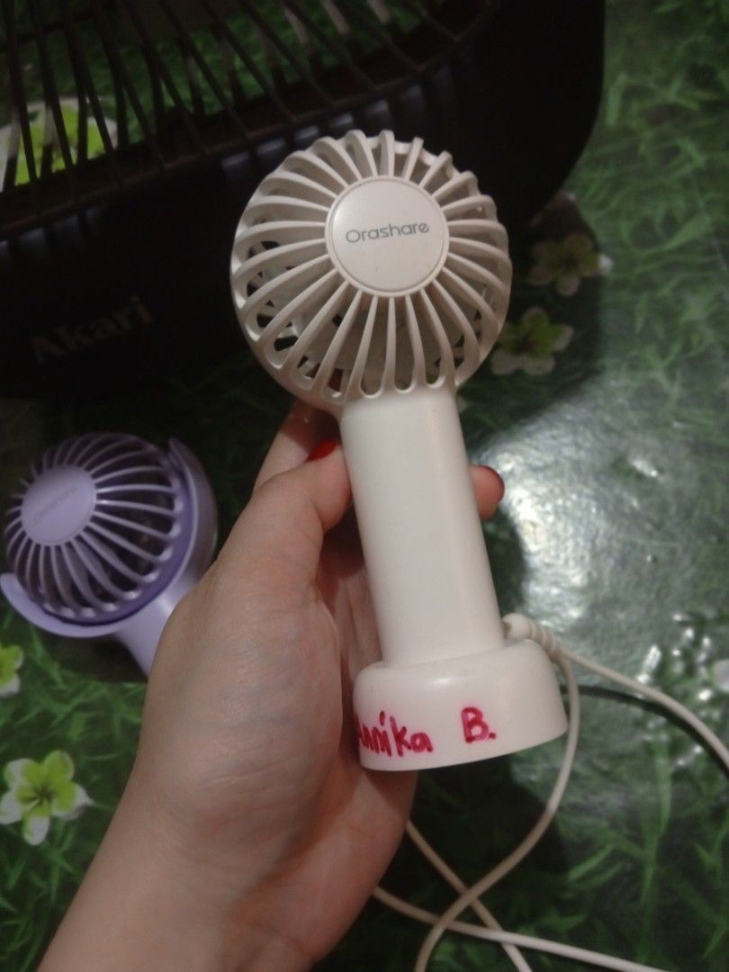 Take all Fans (Category: Fans) located in Cainta. Submitted by ziannika28 (Listing ID 1464808438, Image 3). Description: 2 Orashare fans all working(may sulat lang yung white na fan) Akari fan light lang gumagana d na working yung fan nya No charger included !NO RETURN NO REFUND BUY AT YOUR OWN RISK!.