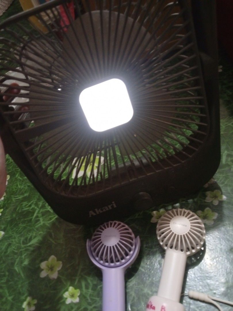 Take all Fans (Category: Fans) located in Cainta. Submitted by ziannika28 (Listing ID 1464808438, Image 2). Description: 2 Orashare fans all working(may sulat lang yung white na fan) Akari fan light lang gumagana d na working yung fan nya No charger included !NO RETURN NO REFUND BUY AT YOUR OWN RISK!.