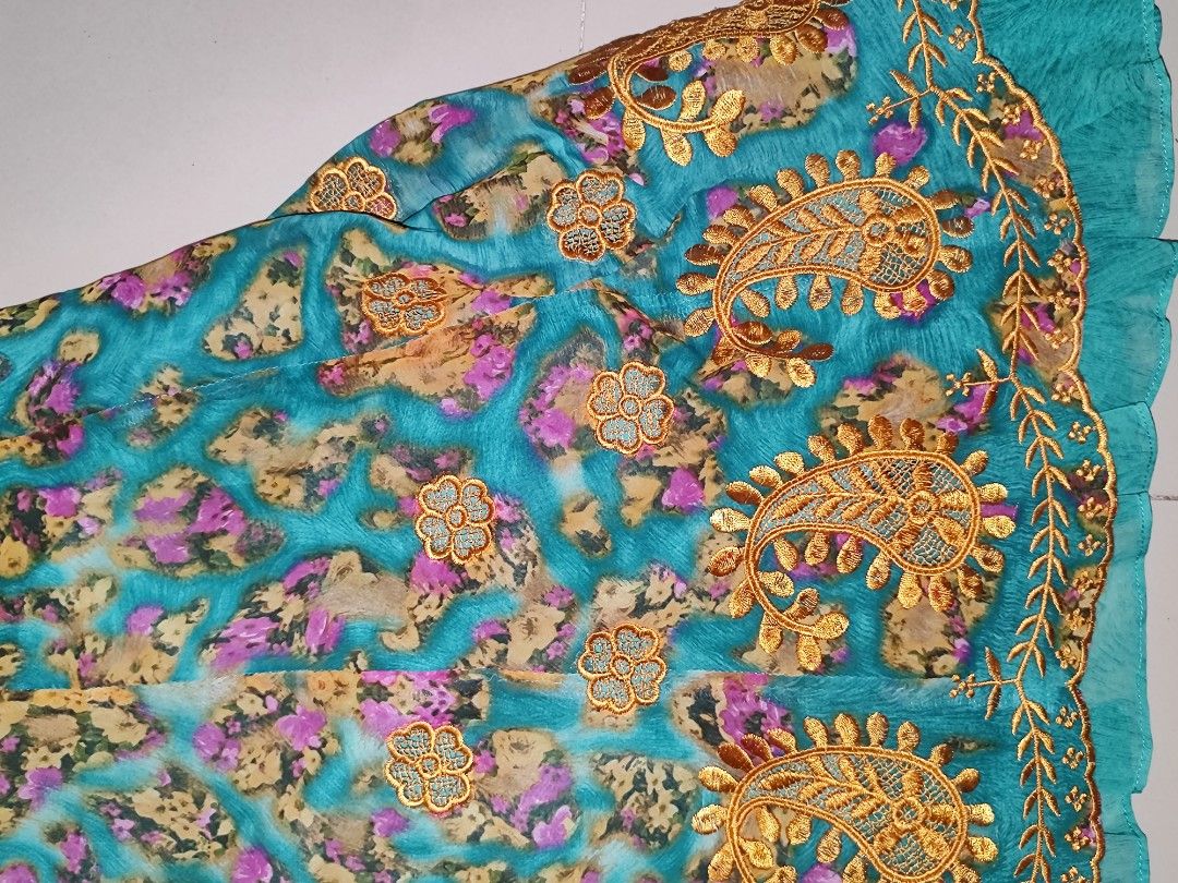 teal short-sleeved mini dress (Category: Dresses) located in Iloilo. Submitted by cynehllevie (Listing ID 1464957062, Image 3). Description: 🍥teal short-sleeved mini dress with a patterned body, mesh neckline, and gold embroidered paisley hem. 🍥good as new 🍥s-m 🍥 really pretty I swear! 🍥no flaws/issues.