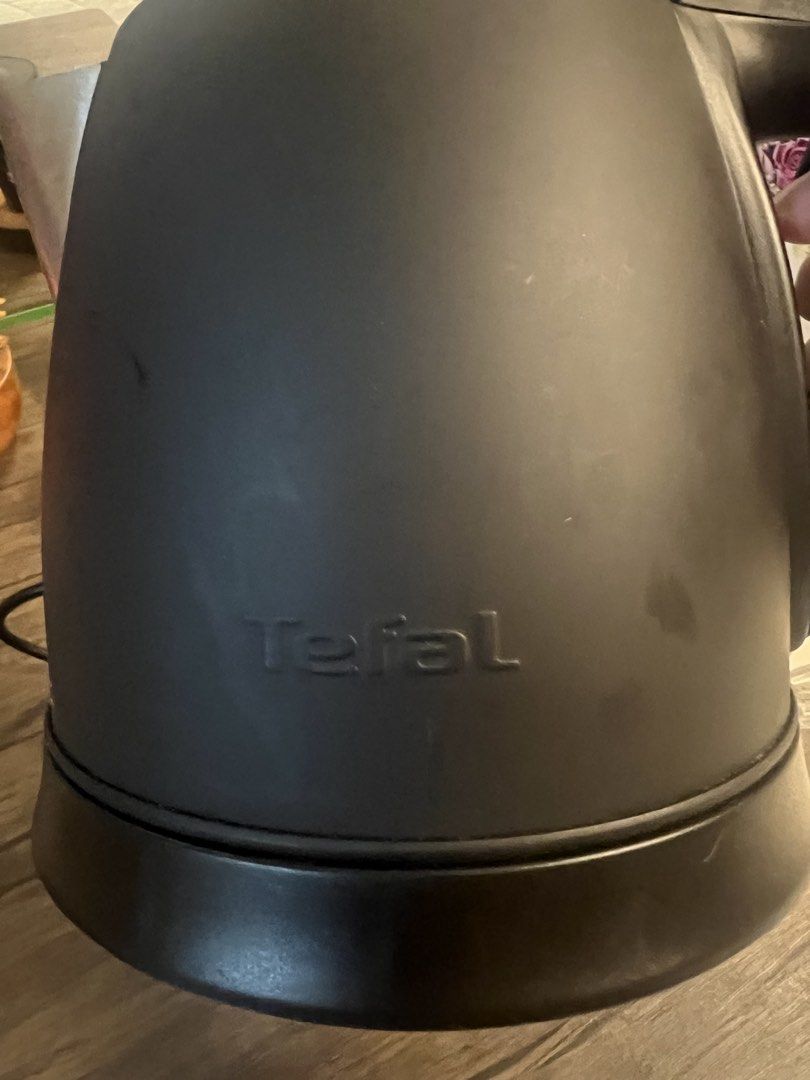 Tefal Black Electric Kettle (Category: Kettles & Airpots) located in Cainta. Submitted by hunchester (Listing ID 1464897187, Image 2). Description: - Brand: Tefal - Color/Finish: Black with a matte body and silver accents - Interior: Stainless steel - Features: Wide-opening hinged lid for easy filling, integrated switch on the handle - Condition: Fully working and tested - Included: Standard power cord.