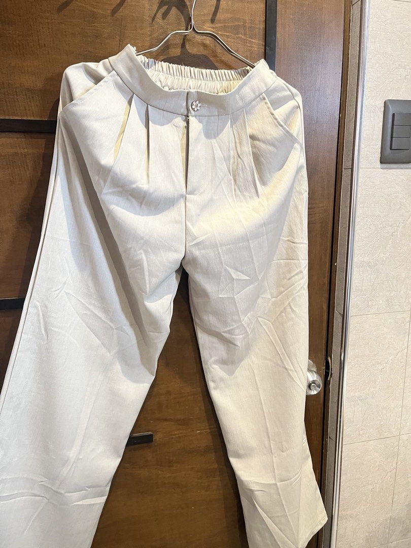 Thai Brand Vest and Pants Set Medium (Category: Sets or Coordinates) located in Las Pinas. Submitted by francesaly (Listing ID 1464795328, Image 3). Description: - Thai brand matching beige vest and trousers set - Size: Medium - Vest: Front button-down closure, decorative buttons, and cute white lace trim - Trousers: High-waist design with stylish front pleats and a comfortable elastic waistband at the back - Versatile neutral color, great to wea