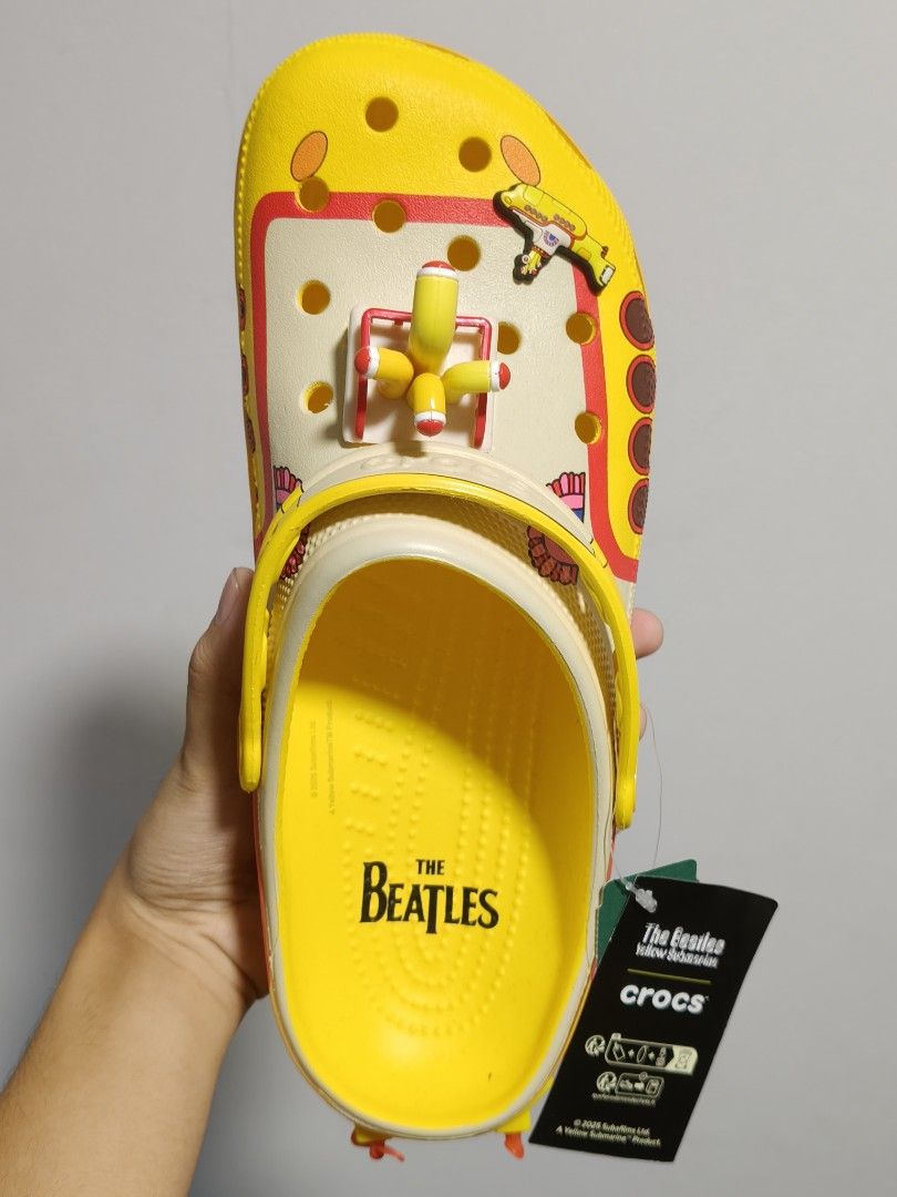 The Beatles Yellow Submarine Crocs (Category: Casual Shoes) located in Marikina City. Submitted by jamvg (Listing ID 1464903511, Image 2). Description: >Ready on hand right now< -Tags still on (but no receipt, since gift) -From Simons (Canada) -Never worn - Can take more pictures per request RFS: Gift from Canada but size is too big Meet-ups only for authenticity Lowest price: Php 8,000 if the buyer is kind..