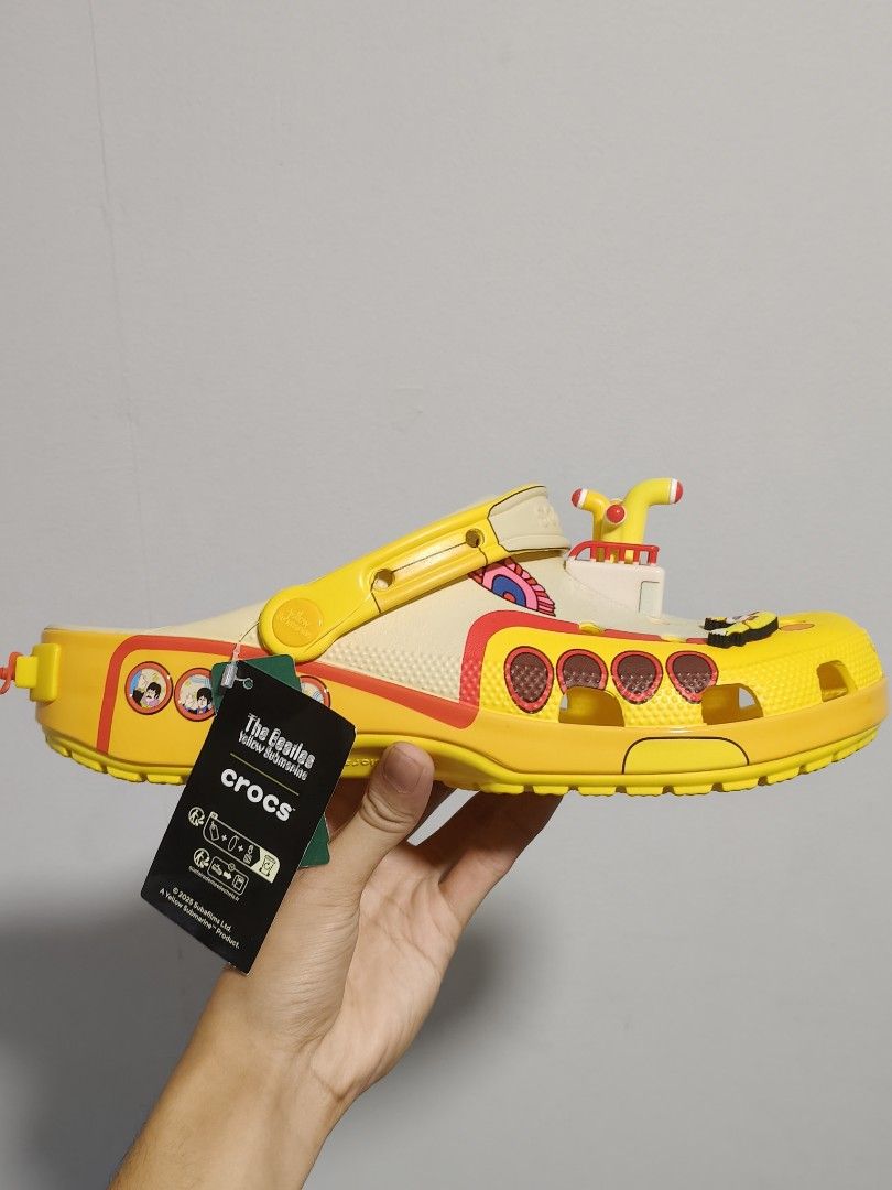 The Beatles Yellow Submarine Crocs (Category: Casual Shoes) located in Marikina City. Submitted by jamvg (Listing ID 1464903511, Image 3). Description: >Ready on hand right now< -Tags still on (but no receipt, since gift) -From Simons (Canada) -Never worn - Can take more pictures per request RFS: Gift from Canada but size is too big Meet-ups only for authenticity Lowest price: Php 8,000 if the buyer is kind..