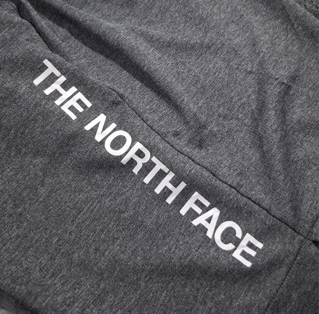 The North Face Grey Athletic Shorts (Category: Shorts) located in Sorsogon. Submitted by johnmichae69459 (Listing ID 1464896372, Image 2). Description: - Authentic The North Face grey athletic shorts - 28 to 34 waistline - 19 lenght - Size 80 (best for waist ~80cm, height 165cm-175cm) - Comfortable elastic waistband with embossed logo lettering - Stylish white branding printed down the leg - Contrast grey panel detail near the waist - Interior ta