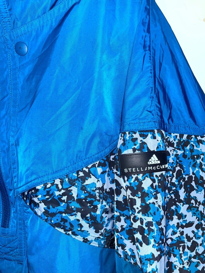 This is the blue Adi by Stella McCartney Athletics Light Pull-On Jacket (Category: Coats, Jackets and Outerwear) located in Iba. Submitted by clctvph (Listing ID 1464966551, Image 3). Description: This is the blue Adi by Stella McCartney Athletics Light Pull-On Jacket Size L on tag Color rate 10/10 Issue: NONE IN GREAT CONDITION💯 985 pesos only‼️.