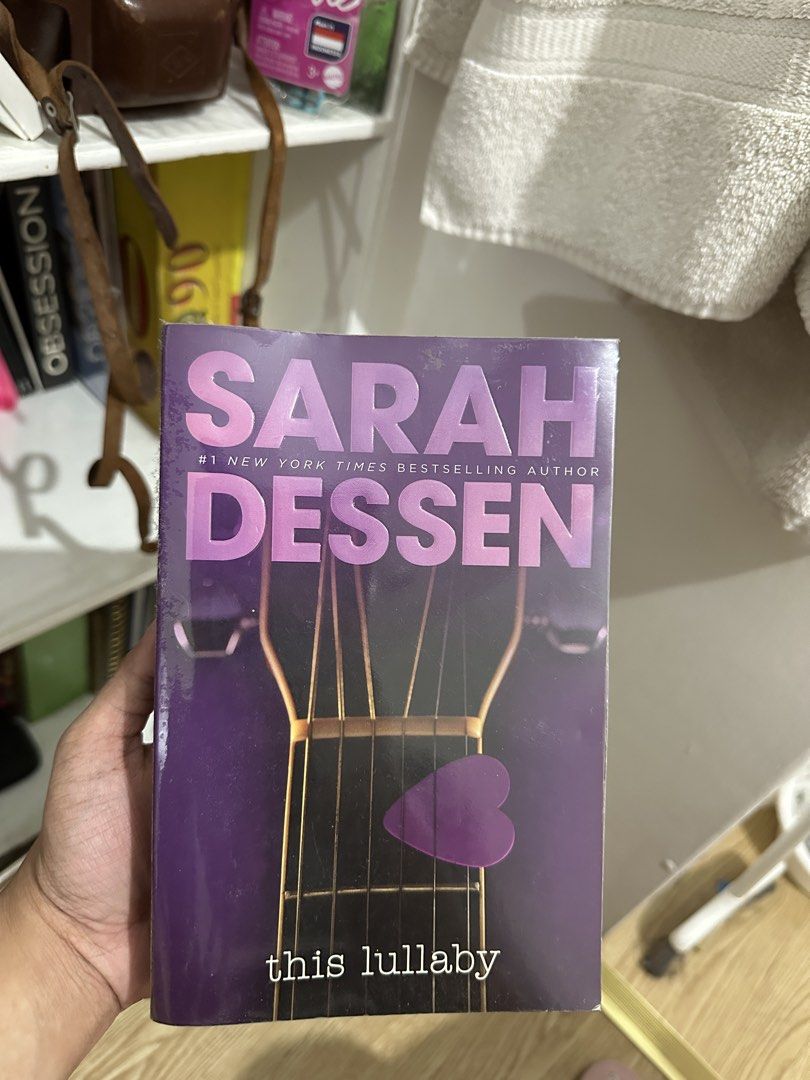 This Lullaby by Sarah Dessen Novel (Category: Storybooks) located in Marikina City. Submitted by natalienase (Listing ID 1464875291, Image 1). Description: This Lullaby by Sarah Dessen - Format: Paperback (Speak Edition) - Cover: Purple with guitar graphic - Condition: Pre-loved, with some surface wear, creases on the edges, and page tanning/yellowing due to age - Genre: Young Adult Romance MOP: Gcash/Maribank/Bank Transfer MOD: Lalamove Feel fre
