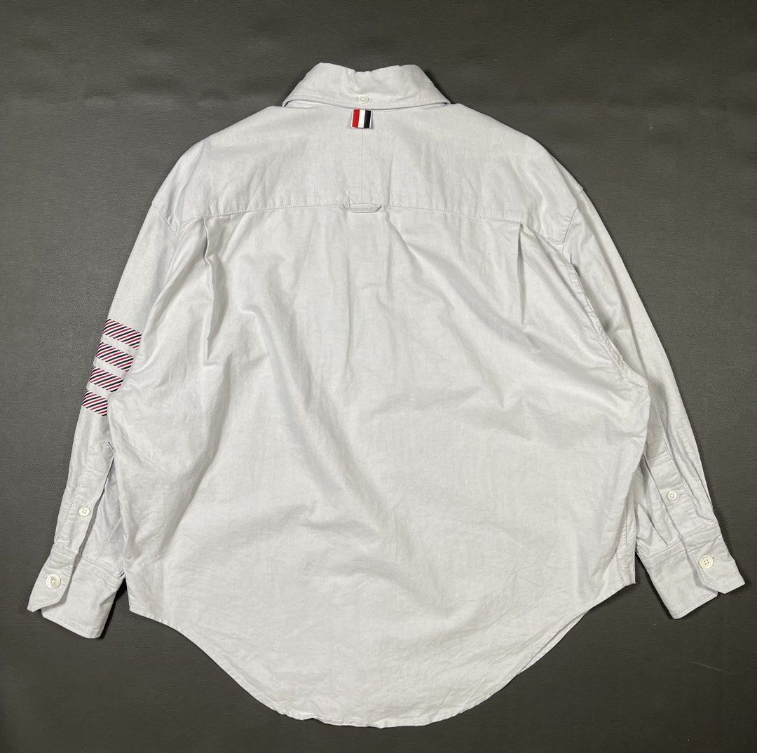 Thom Browne 4-Bar Stripe Oxford (Category: Formal Shirts) located in Caloocan City. Submitted by dapreluv (Listing ID 1464924938, Image 3). Description: Thom Browne 4-Bar Stripe Oxford Brand: Thom Browne New York Product Style / Code: ⁠FLL099A-06177-035⁠ (also listed as ⁠FLL099A 06177035⁠) Item Description: Thom Browne 4-Bar Stripe Oxford Cotton Button-Down Shirt with Armband Size: 40 (equivalent to IT 40 / US Small / Thom Browne size 1) Fabric C