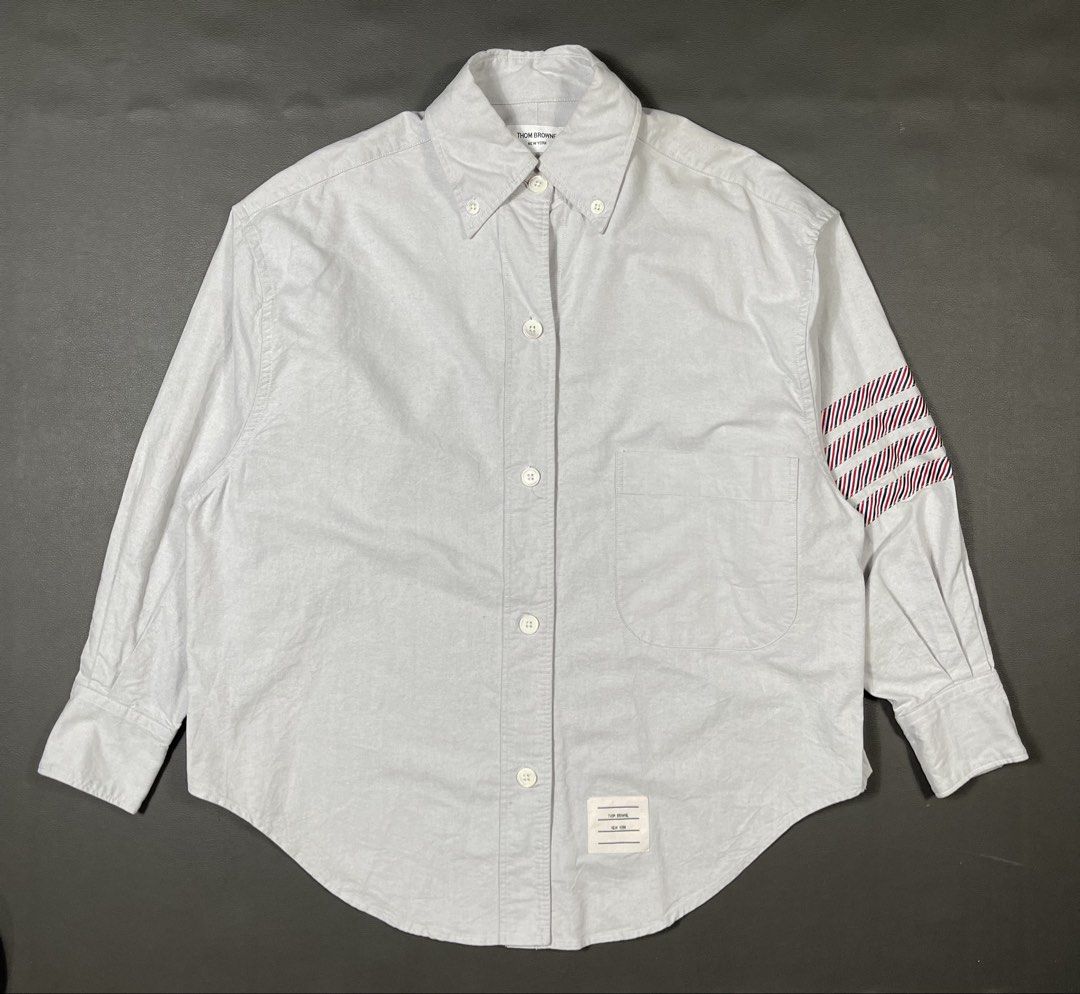 Thom Browne 4-Bar Stripe Oxford (Category: Formal Shirts) located in Caloocan City. Submitted by dapreluv (Listing ID 1464924938, Image 1). Description: Thom Browne 4-Bar Stripe Oxford Brand: Thom Browne New York Product Style / Code: ⁠FLL099A-06177-035⁠ (also listed as ⁠FLL099A 06177035⁠) Item Description: Thom Browne 4-Bar Stripe Oxford Cotton Button-Down Shirt with Armband Size: 40 (equivalent to IT 40 / US Small / Thom Browne size 1) Fabric C
