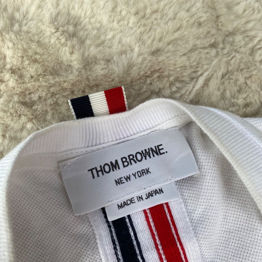 THOM BROWNE - SHIRT (Category: Activewear) located in Bacolod City. Submitted by mic_moneyyyyy (Listing ID 1462027881, Image 3). Description: THOM BROWNE - SHIRT Size : Tagged as 2 Width : 20 Length : 27 Condition : Excellent No issue need wash only.