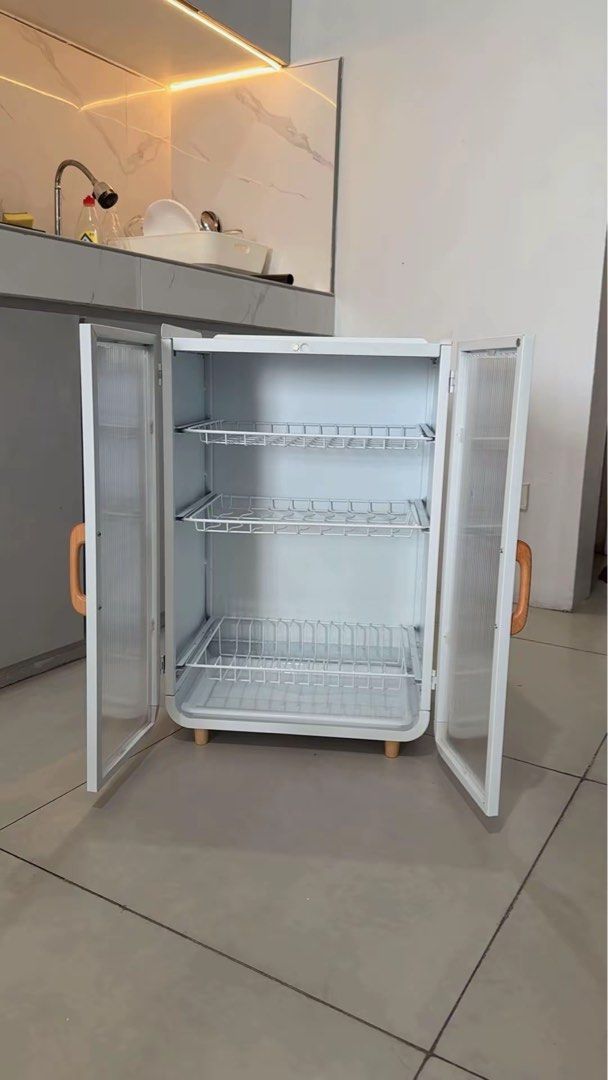Three Tier White Dish Rack Kitchen Cabinet (Category: Food Organization & Storage) located in Manila. Submitted by iravillone31747 (Listing ID 1464805129, Image 2). Description: Pa dm ako for video, may super minimal dents due to delivery, selling super low.