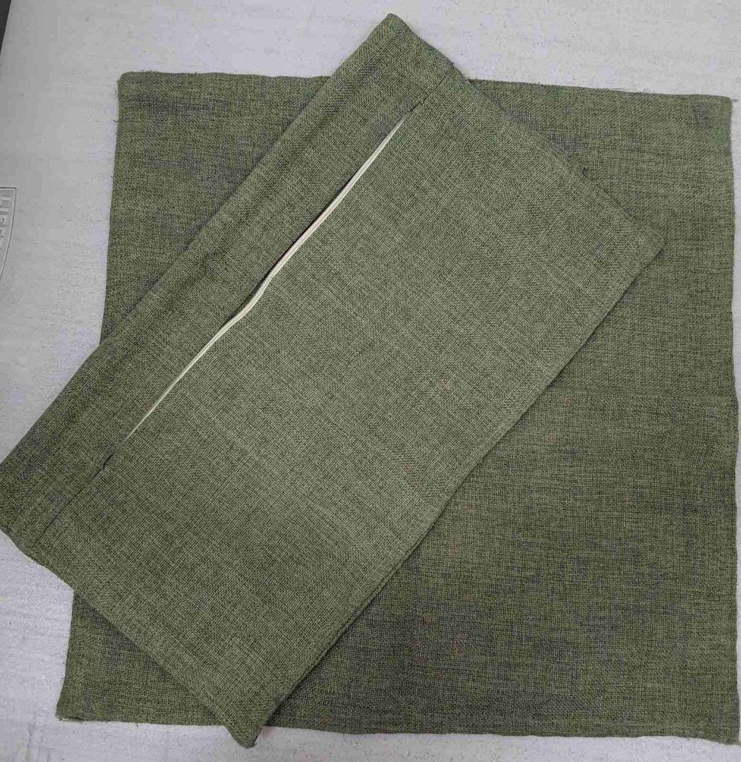 Throw pillow covet (Category: Cushions & Throws) located in Caloocan City. Submitted by 211sc (Listing ID 1464833084, Image 1). Description: -use for 1 year, kept in storage. needs washing. - Size 44cm x 44cm -2 pcs (100 pesos each) - olive green suede like .