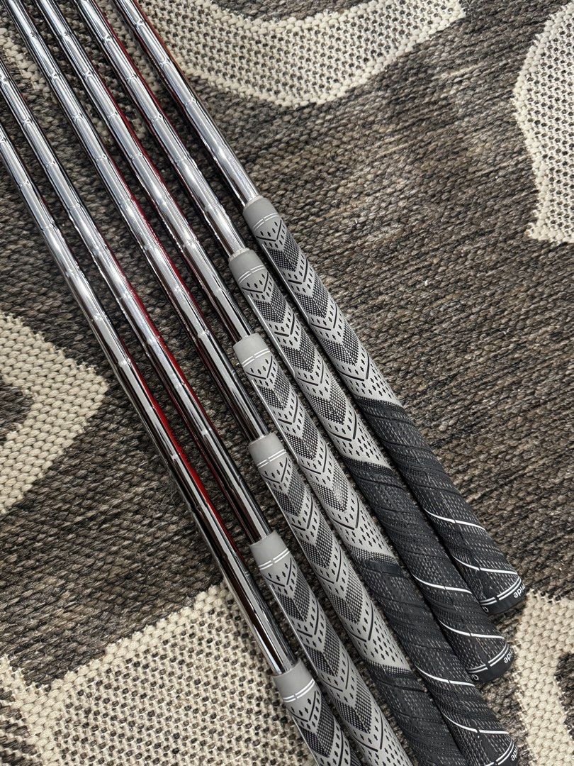 Titleist 714 CB Forged Irons Set (Category: Golf) located in Manila. Submitted by anpanmags (Listing ID 1464912738, Image 3). Description: - Model: Titleist 714 CB Forged Iron Set (numbers visible on hosels) - Design: Cavity back with traditional muscle channel - Shafts: Steel shafts with red shaft bands - Grips: Golf Pride multi-compound grips installed - Condition: Normal bag chatter and face wear from standard play, clean grooves ready for the