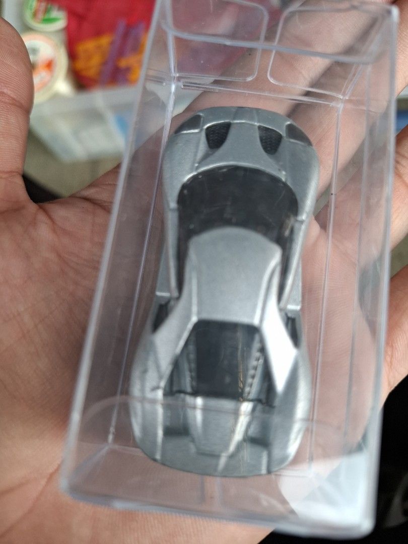 Tomica Ford GT Concept Car Diecast Model (Category: Vehicle & Diecast Models) located in Manila. Submitted by rocksolid227 (Listing ID 1464824374, Image 3). Description: - Model: Tomica Ford GT Concept - Color: Silver - Release Year: 2017 - Made in: Vietnam - Condition: Stored in a clear protective plastic display case - Features: Wheels roll freely, underside details clearly stamped.