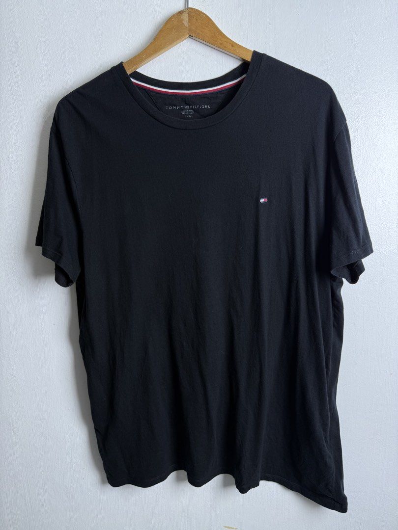 Tommy Hilfiger black TEE (Category: Tshirts & Polo Shirts ) located in Daraga. Submitted by casualthread (Listing ID 1464905481, Image 1). Description: Authentic Large fit 22x29 Need wash Blsck na black 9.8/10.