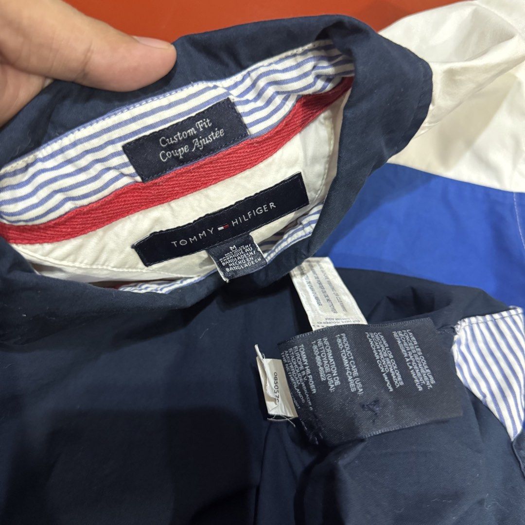 TOMYM HILFIGER BUTTON DOWN LONG SLEEVES POLO (Category: Formal Shirts) located in Pasig City. Submitted by buzzthrifty (Listing ID 1464886061, Image 3). Description: SIZE M ON TAG FITS L-XL 22x29 EXCELLENT CONDITION LAST PIC ISSUE NOT SURE IF NEEDS WASH OR SUNFADE.