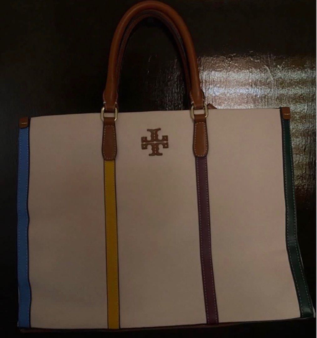 Tory Burch (Category: Tote Bags) located in Manila. Submitted by bwshoppe (Listing ID 1464891420, Image 2). Description: Tory Burch tote bag in 2 ways, hand bag/shoulder bag Condition, slightly used only. Complete with tag & care card .
